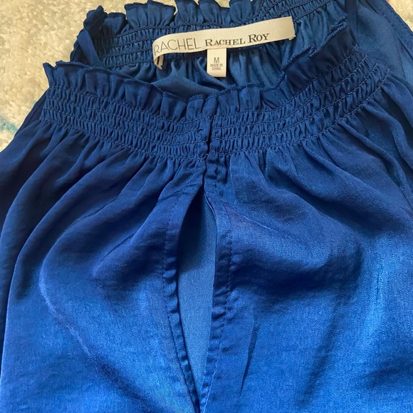 Rachel Roy asymmetrical sleeveless flowy top with adjustable peep hole opening - Picture 5 of 7